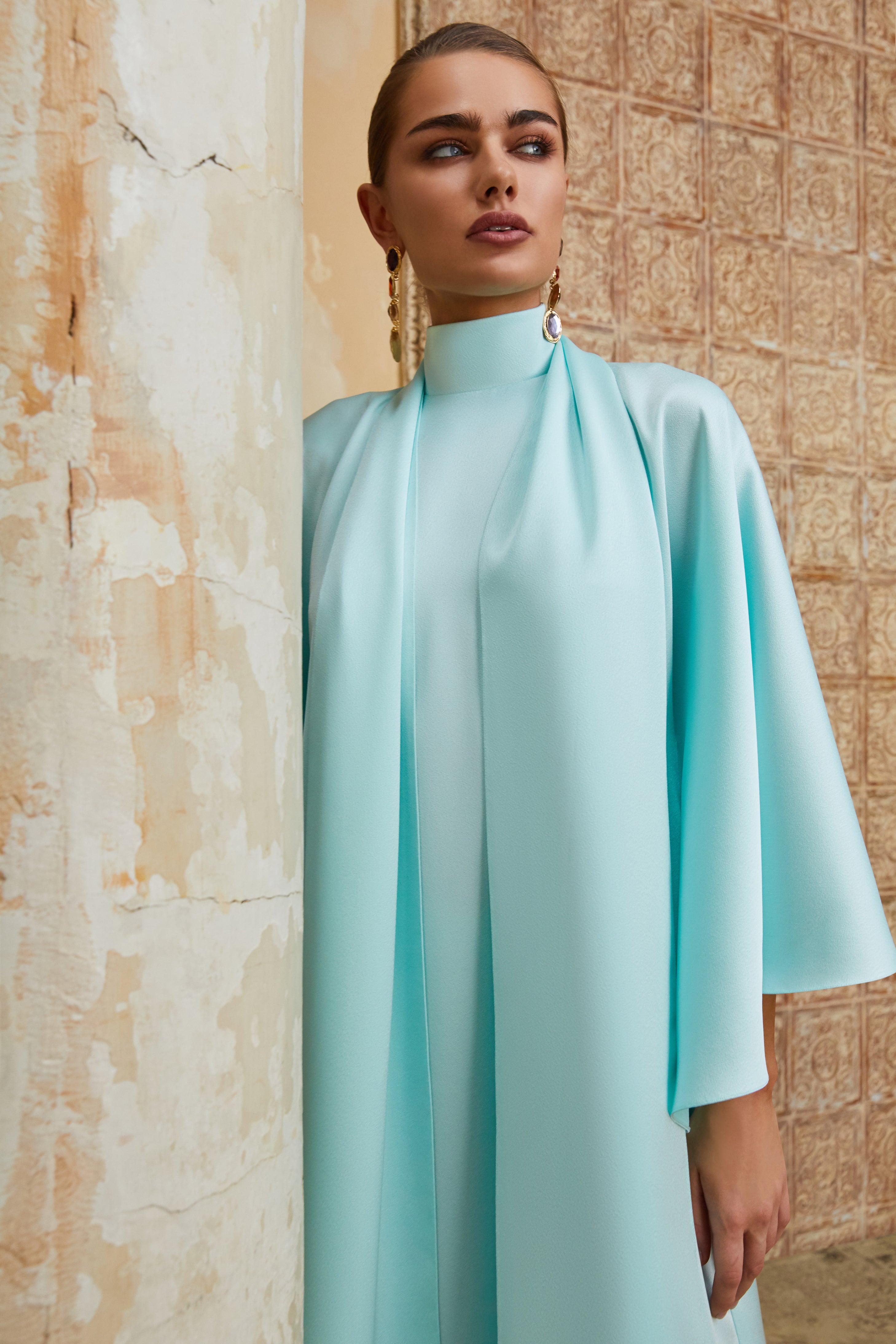 Bow-embellished satin voluminous gown