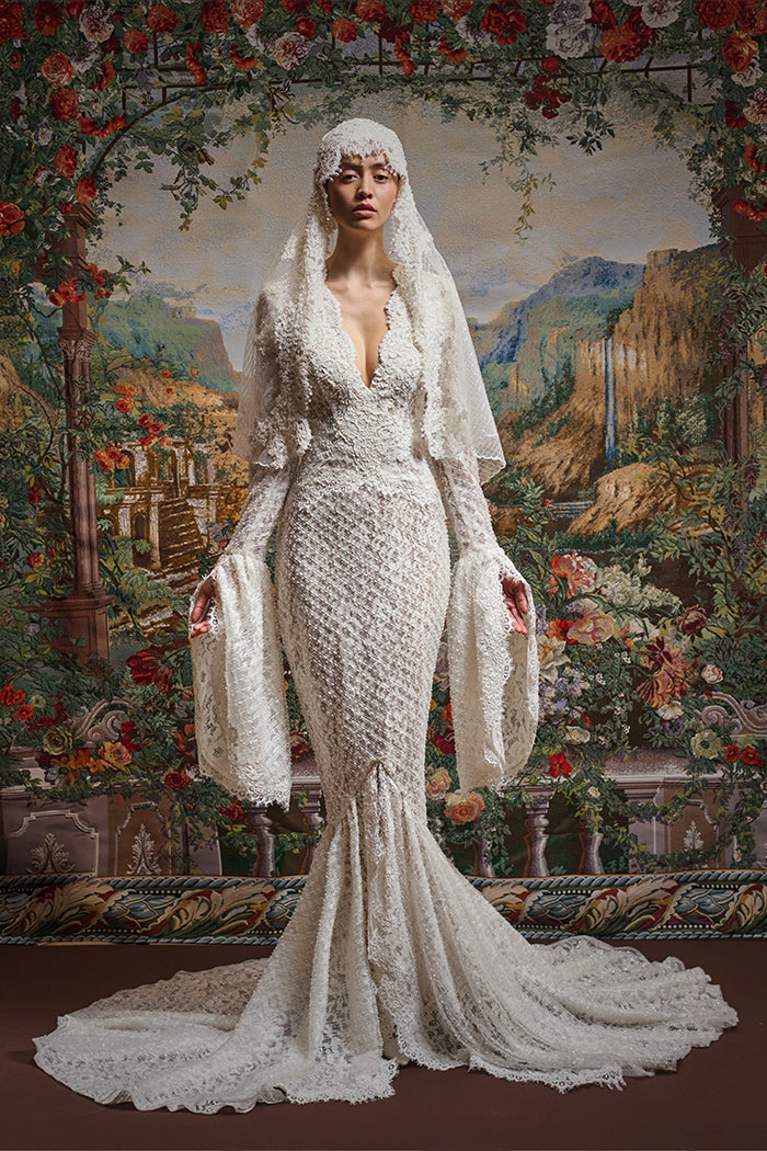 Maxi dress with a train and corded lace inserts