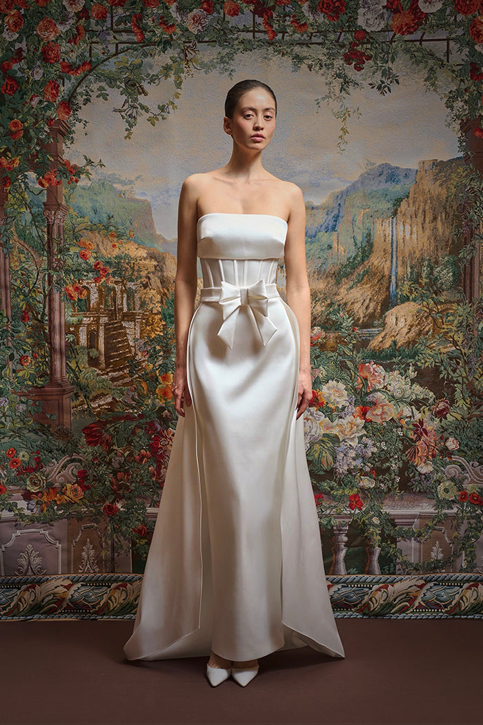 Satin maxi dress with an overskirt train and a bow