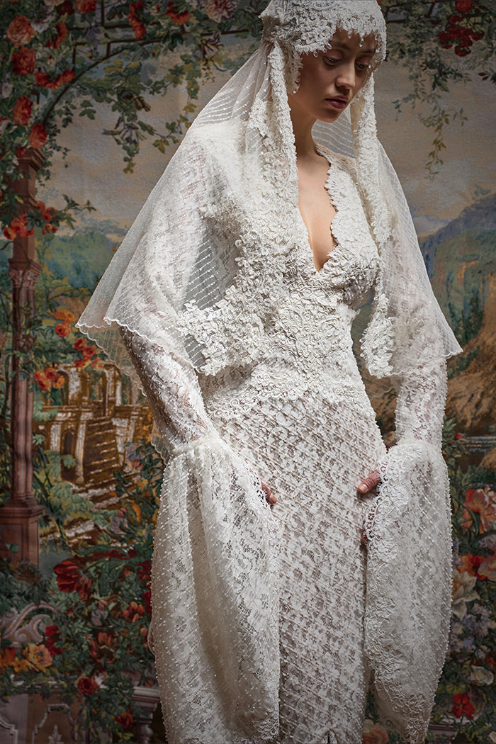 Maxi dress with a train and corded lace inserts