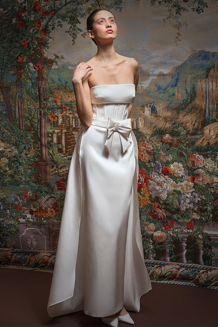 Satin maxi dress with an overskirt train and a bow