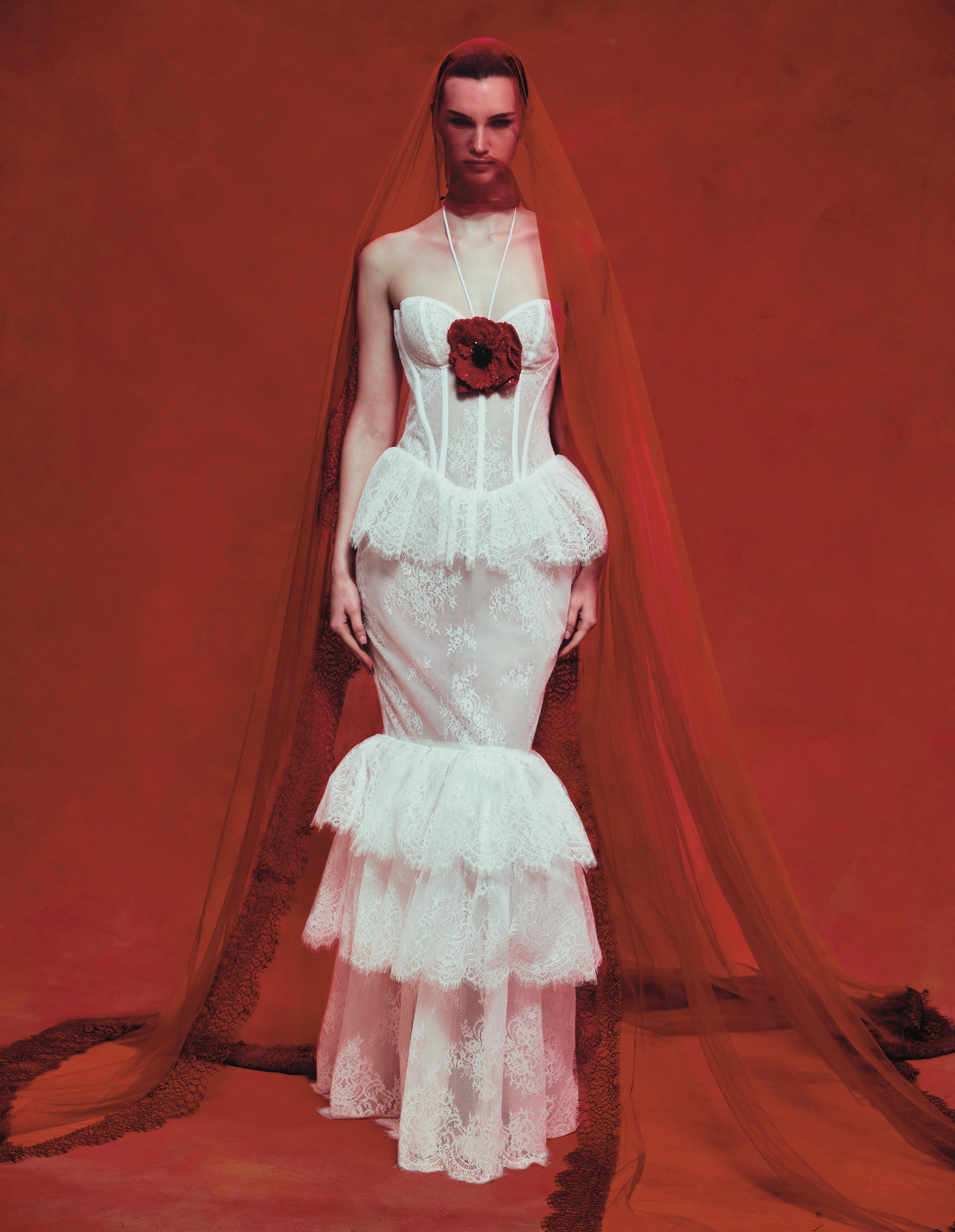 Lace maxi dress with a red sequined flower