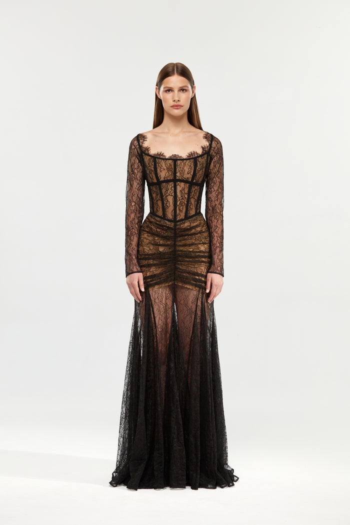 Corset lace gown with a draped skirt