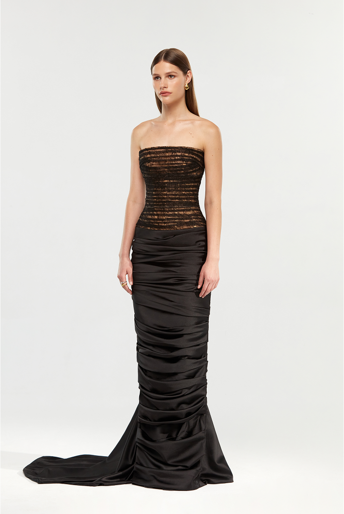Draped lace and satin gown with a train
