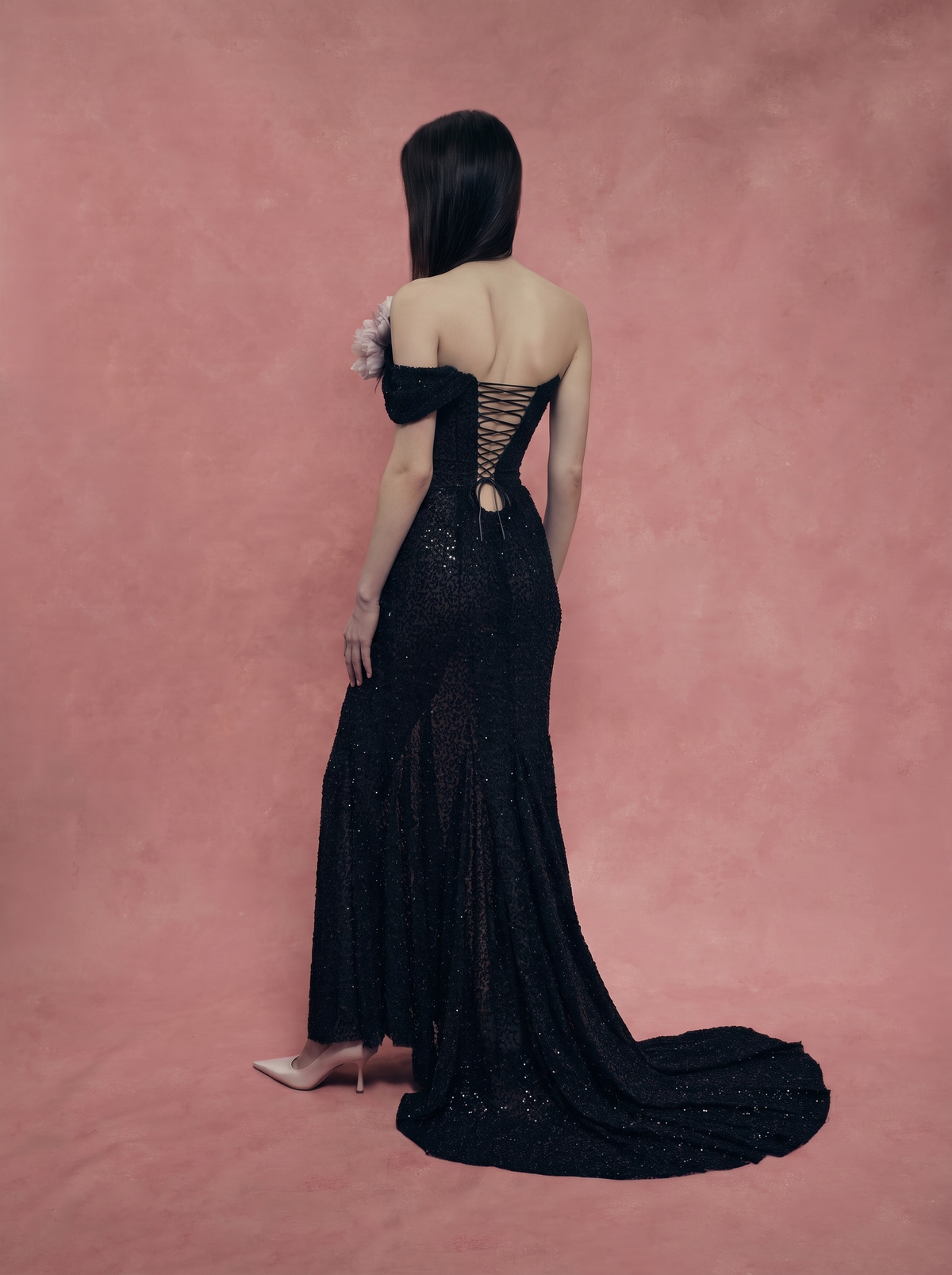Long embroidered dress with an asymmetrical top and a silk brooch