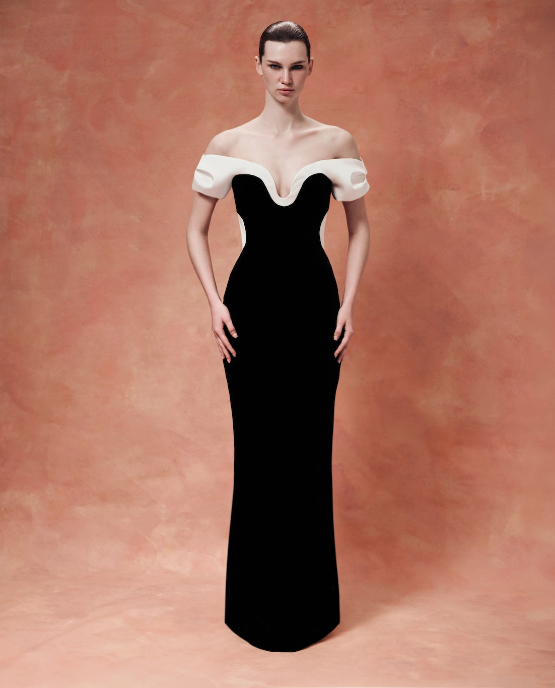 Velvet maxi dress with a sculpted neckline and open back