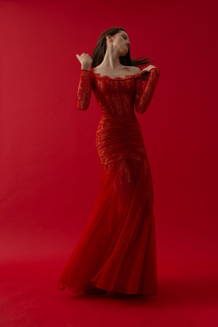 Corset lace gown with a draped skirt – Rasario