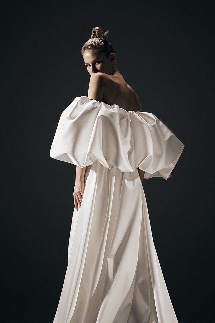 Satin gown with detachable voluminous sleeves and cape – Rasario