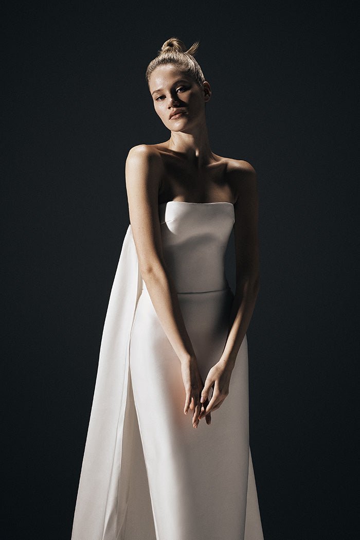 Satin gown with detachable voluminous sleeves and cape – Rasario