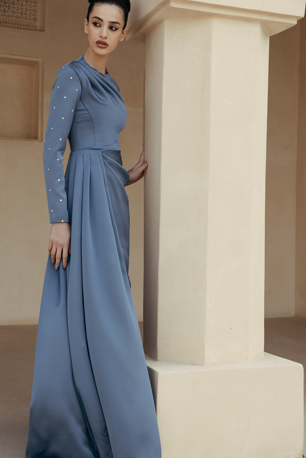 Draped satin gown with embroidered sleeves