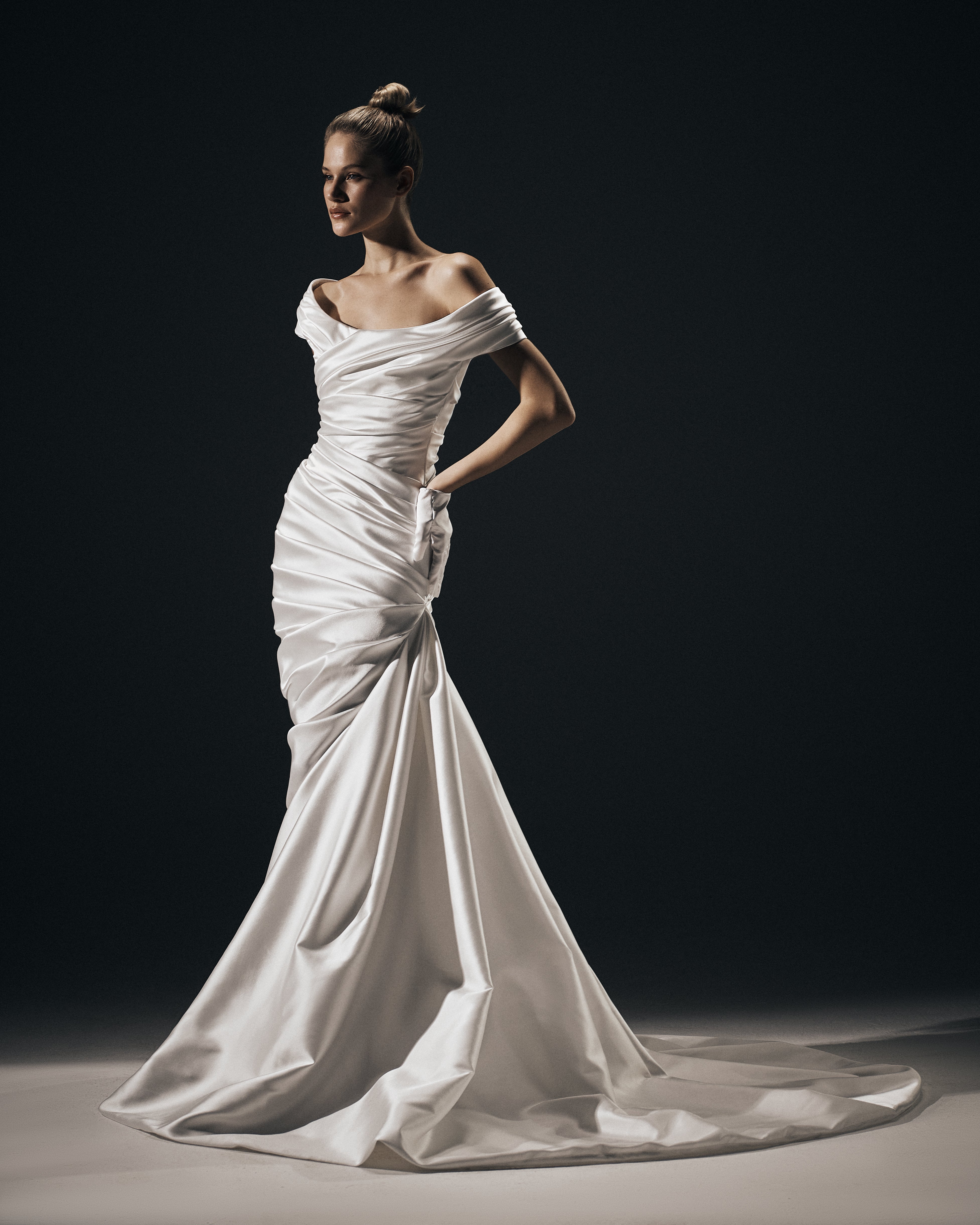 Draped satin gown with a train