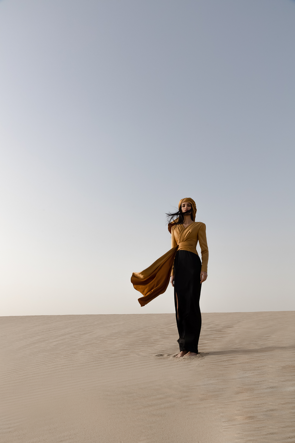 Draped satin maxi dress with voluminous shoulders