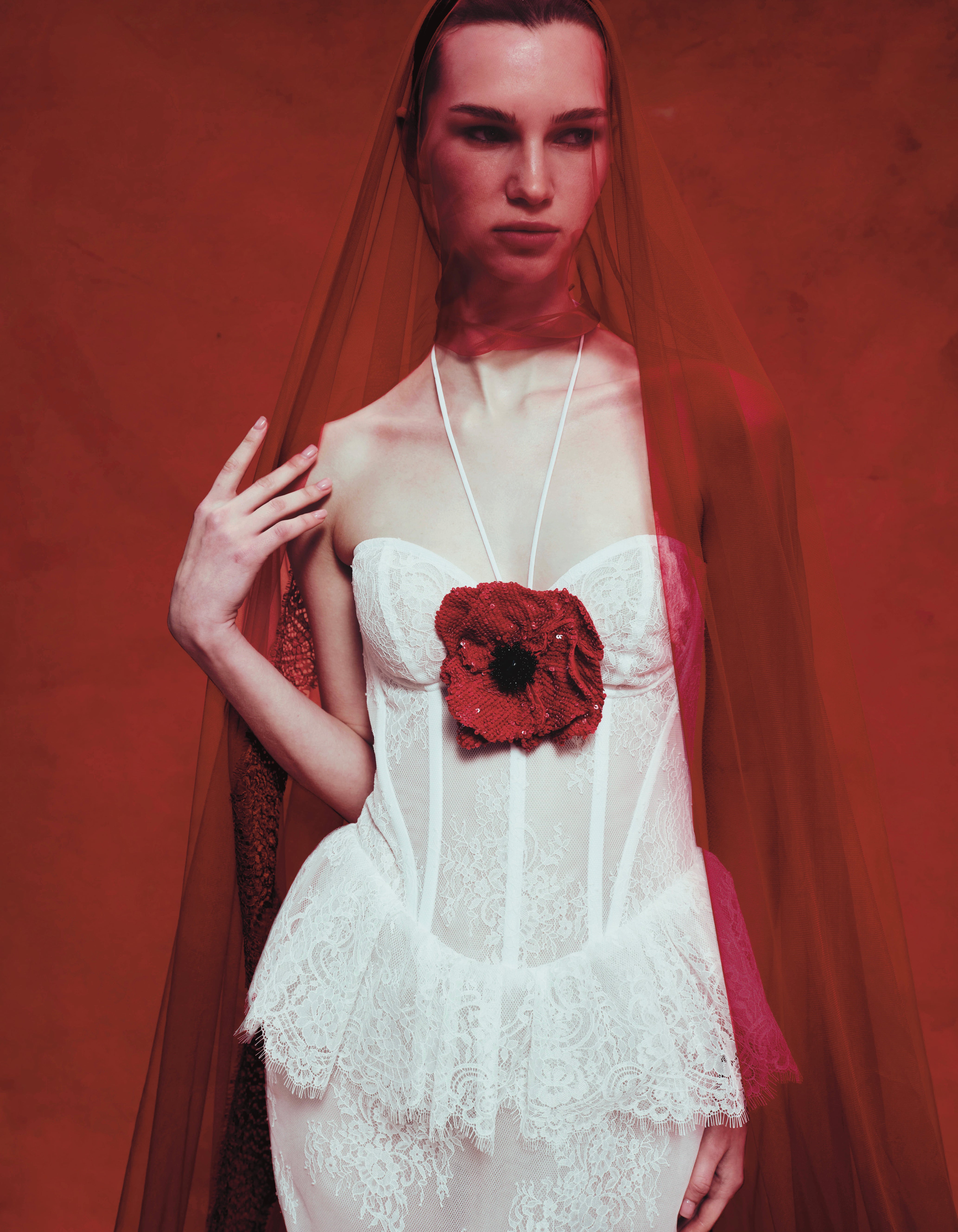 Lace maxi dress with a red sequined flower