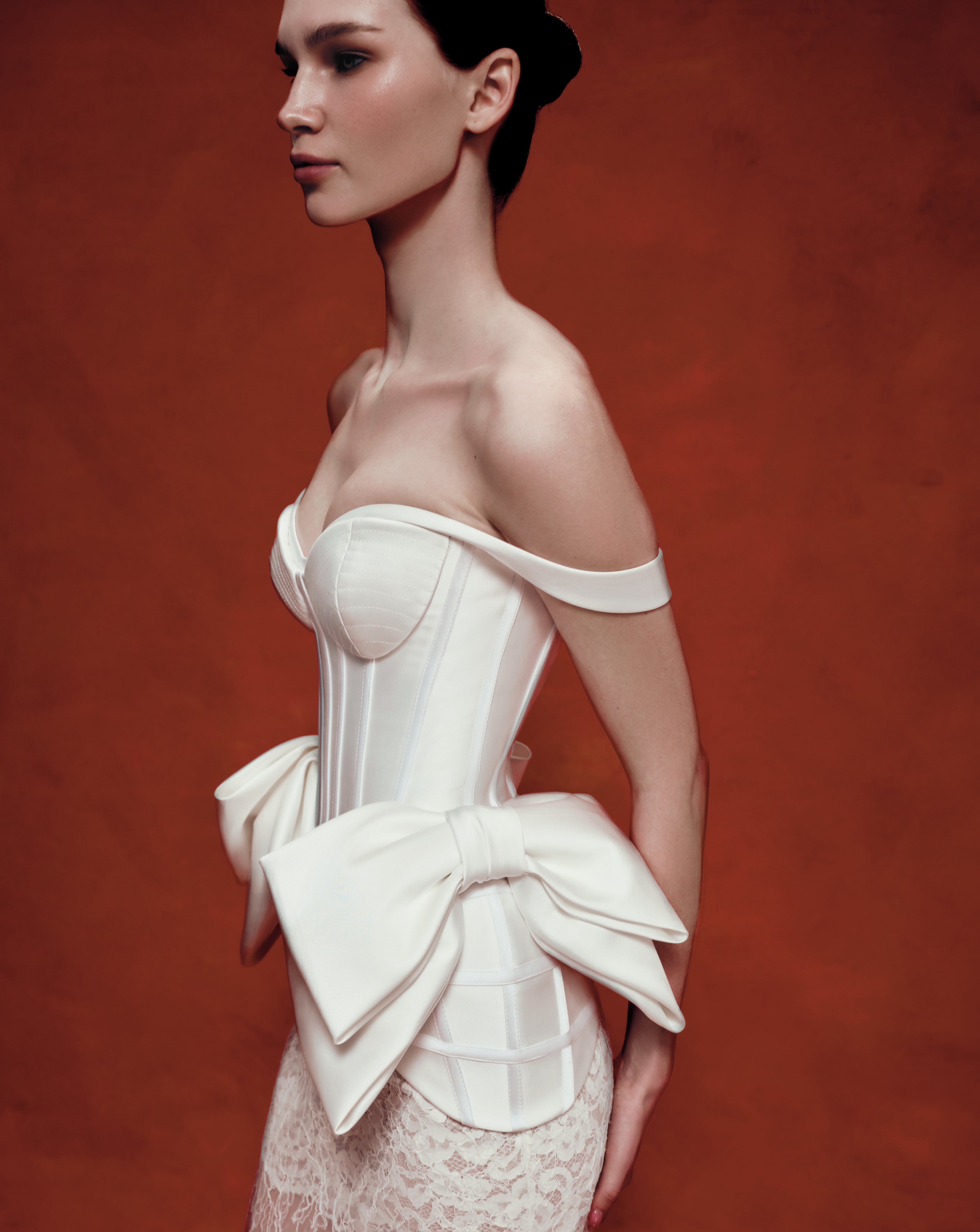 Sculpted satin corset with bows