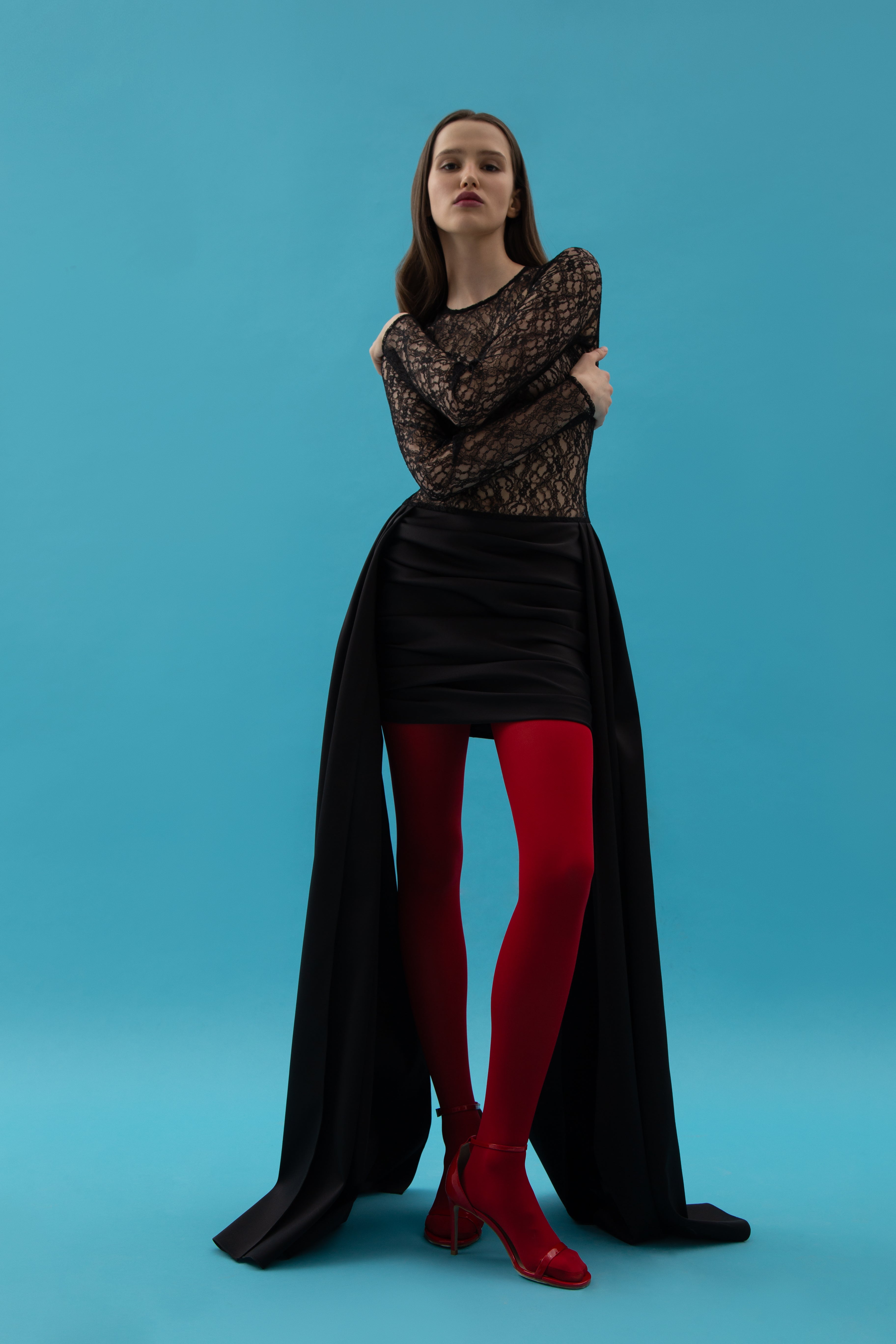 Lace and satin mini dress with a train and a covering top