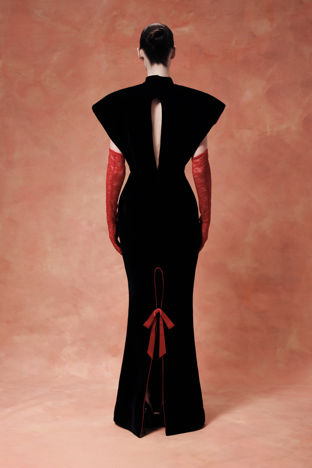 Velvet maxi dress with sculptural sleeves and teardrop back