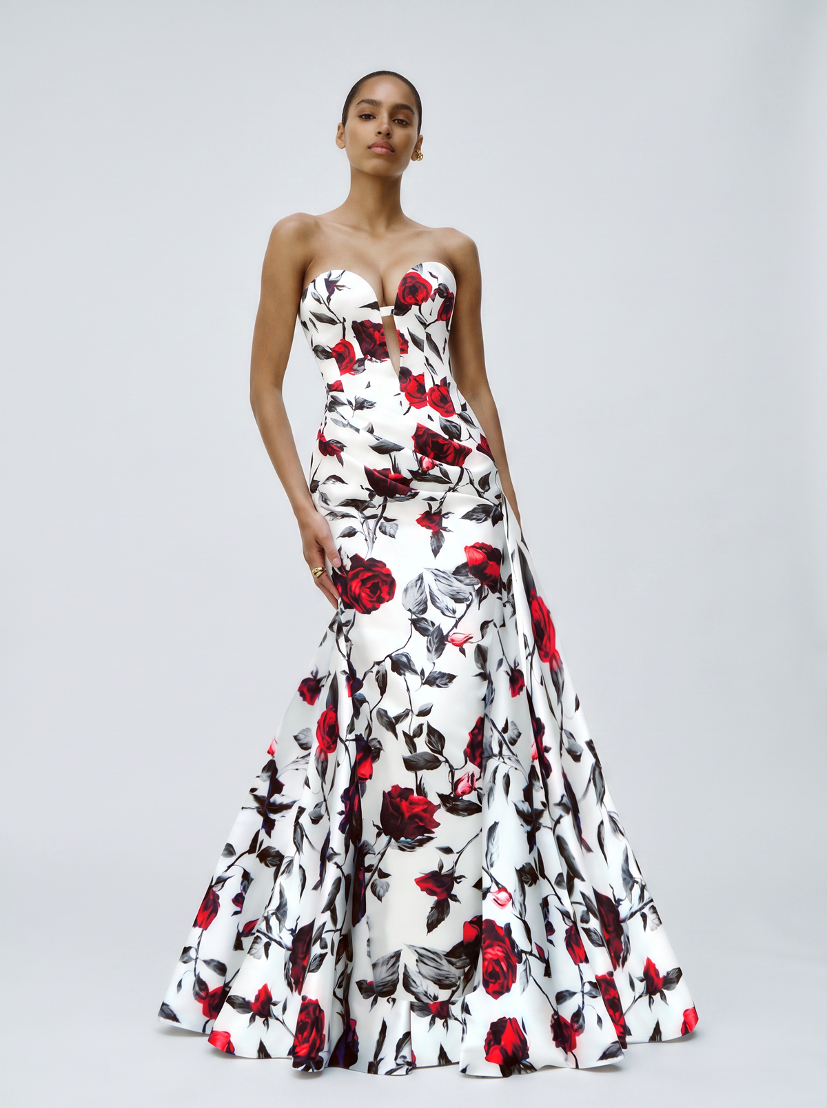 Draped printed satin dress with a side train