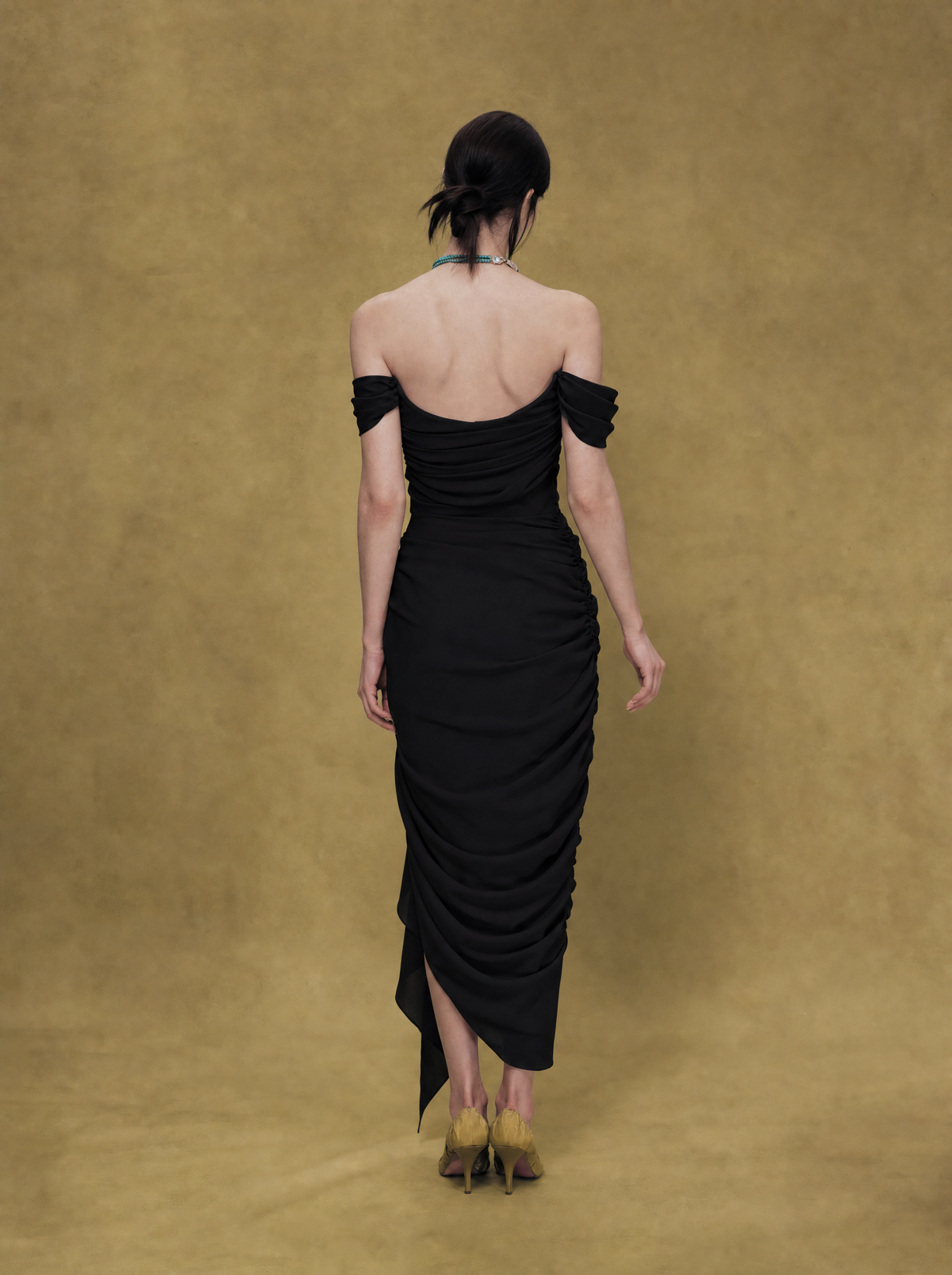 Off-shoulder dress with draping